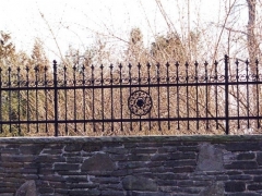 hand forged custom fence'