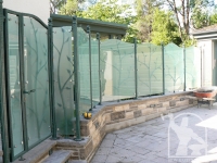 wrought-iron-tree-privacy-glass-fence-1