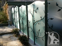 wrought-iron-tree-privacy-glass-fence-2